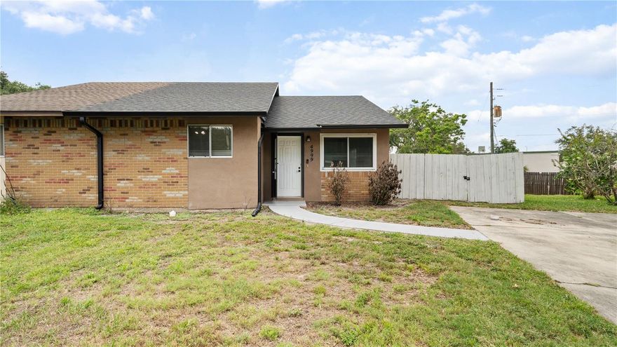 Welcome to this affordable and charming 2-bedroom, 2-bath duplex in the peaceful Dover neighborhood of East Orlando. Offering nearly 1,000 square feet of living space, the home features an open floor plan with ample storage, modern stainless steel appliances, laminate flooring, and a beautifully updated interior and exterior. Bright windows fill the home with natural light, creating a warm and inviting atmosphere throughout. The primary suite includes its own private bath, while the second bedroom is perfect for guests, a home office, or a study. Conveniently located near the 408 and I-4 highways, downtown Orlando, restaurants, shopping, and more, this property also falls within the zoning for Dover Elementary, Roberto Clemente Middle, and Colonial High. Move-in ready, this home is ideal for anyone seeking comfort, convenience, and affordability in Orlando.