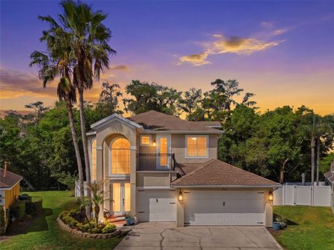 Photo of 6841 Bouganvillea Crescent Drive, Orlando, FL 32809 (MLS # O6399117)