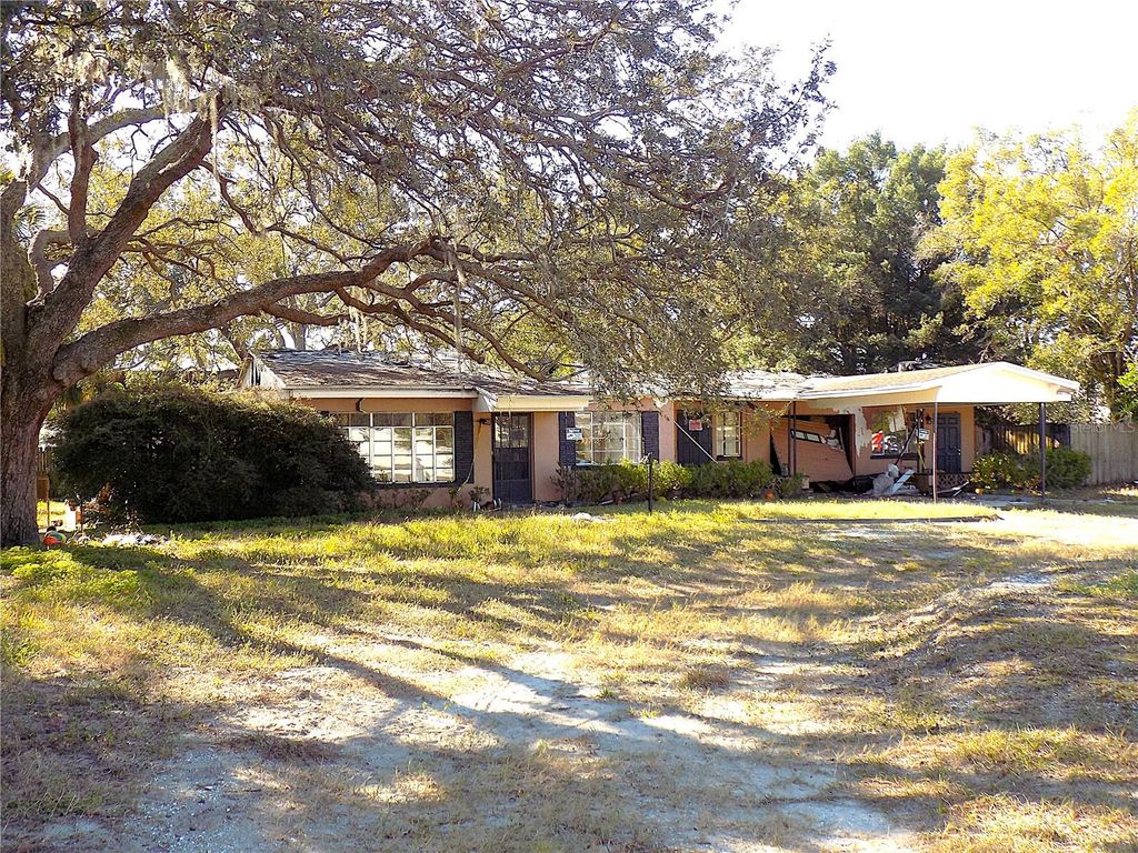 Photo of 5509 Temple Heights Road, Temple Terrace, FL 33617 (MLS # TB8458632)