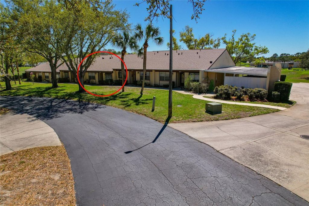 Photo of 11241 Dollar Lake Drive #4, Port Richey, FL 34668 (MLS # W7883901)