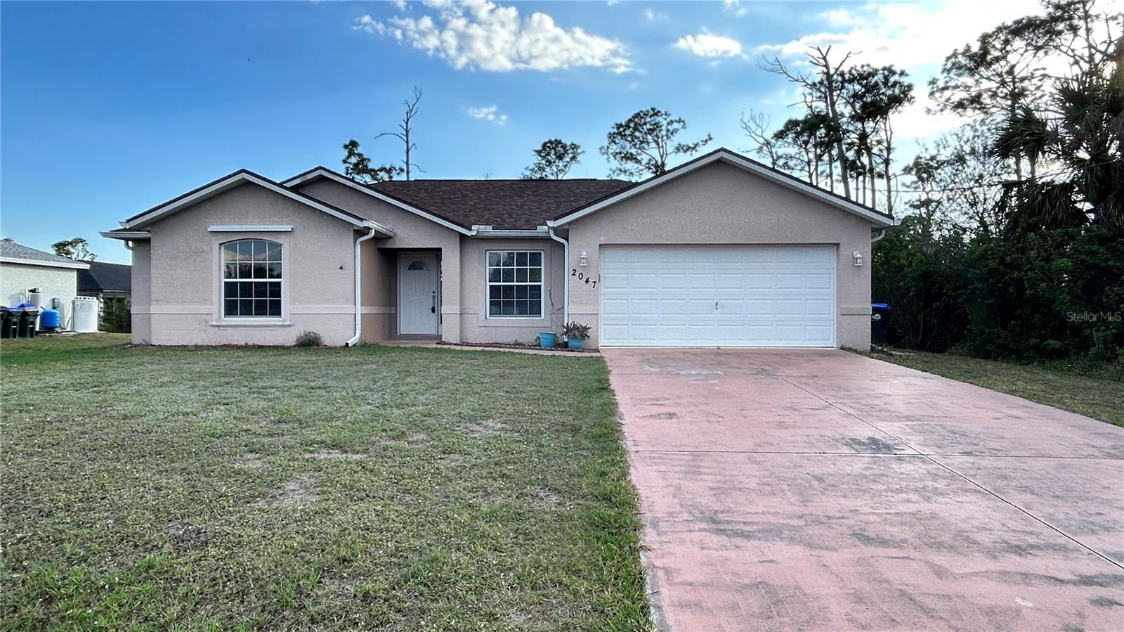For annual rent: This single-family home features 3 bedrooms, 2 bathrooms, and a 2-car garage, along with a screened enclosure. The property is ideally located, offering easy access to grocery stores, Port Charlotte Mall, and major roadways.