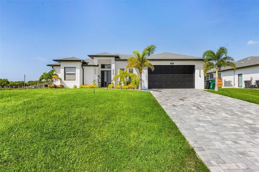 Photo of 1202 NE 21st Avenue, Cape Coral, FL 33909 (MLS # TB8547189)