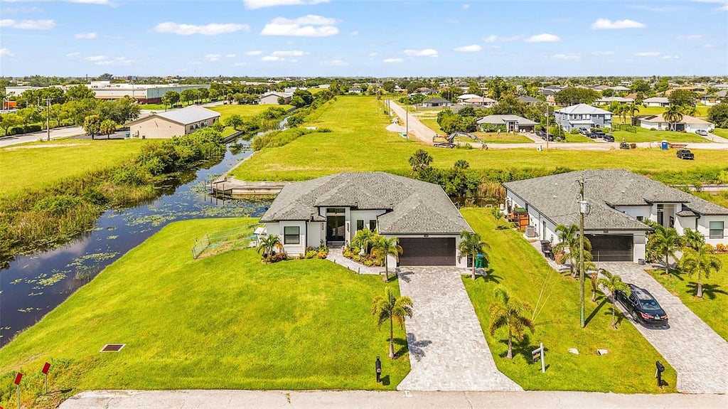 Photo of 1202 NE 21st Avenue, Cape Coral, FL 33909 (MLS # TB8547189)