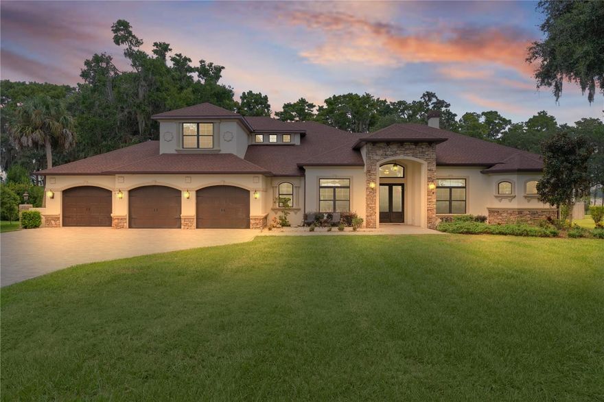 If you're looking for that wow factor, you found it! It's gorgeous, custom built on Lake Rousseau. Enjoy the most spectacular sunsets and a quick boat ride to Rainbow Spring for your swimming, snorkeling or floating down the river and of course, that great bass fishing in your own backyard. Florida life at it's best. Gated community, house on 1.2 acres. House is absolutely impeccable, as well as the outside grounds. Brick paved driveway leads you up to the home w/4 bedrooms plus 2 offices, almost 4000 sq ft living. Upon entry, large foyer, stepping in to the massive great room with gas fireplace, tall, vaulted ceiling, creating a spacious and airy atmosphere with beautiful kitchen to your left, formal dining room up front, along with an office, and another office after you walk thru the kitchen. Master bedroom to your right and yet a second bedroom on the 1st floor as well, with half bath in the hallway. Kitchen overlooks great room with island, granite countertops, dbl convention oven, stove cooktop is gas, wine cooler, 2 mini fridges. Walk in pantry, wine bar and coffee bar, breakfast nook a one end with lake view. upstairs you have a large sitting area
of 18x20, so spacious stunning view of the lake. Another 2 bedrooms with jack n jill bath between, upstairs as well. Double car grg is very over sized 25x32 along with another one14x28 pull thru with grg doors on both sides. Makes it for plenty of storage , or store your boat. Outside offers you the lakeside living area you deserve. Enormous screened in lanai for your grilling and entertainment. Dock with boat lift (covered), pier. Sit on your hanging swing & enjoy the beautiful view..
