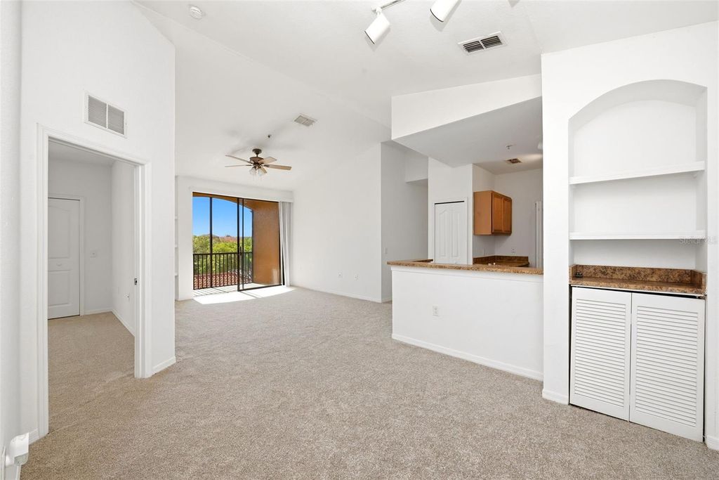 Photo of 6169 Metrowest Boulevard #305, Orlando, FL 32835 (MLS # O6417967)
