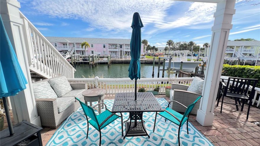 Waterfront Key West Style Complex, winter $3000 ask about special summer rate. Also available annually furnished. Well appointed first floor condo on canal water view and of Sunshine Skyway bridge from patio. Pets welcome. New quartz counter top, Maytag , GE appliances,  solid wood cabinets, hurricane windows, plantation shutters, butcher block breakfast bar, plus a dinette. Great room includes comfy sofa, a chair futon (converts to child size sleeper). Travertine flooring throughout. Bathroom - All marble tile, step in shower, seat plus small depth to soak. Queen Iron headboard bed, wicker dresser and nite stands, lamps have usb outlets. Totally turn key: Linens, china, Smart TV's. Spacious bricked patio, give you so much additional living space, custom gate, fenced private patio partially covered. Watch the water change daily, miles of walking along seawalls, state of the art gym, fitness center, Dog park. Active yacht club, two pools, both heated, separate spa, day fishing dock. Bring your Kayak or SUP, boat watching, play volley ball, lighted tennis, and pickle ball and basketball courts, shuffle board, horse shoes. Recline on the hammocks at the pond and watch the waterfowl. 4.6 miles to downtown, every culinary delight, sidewalk waterfront cafe's, museums, live theater, movie theater, art galleries, and major league baseball at the Trop, prefer 3 -4 months or more; Mo2Mo ask for pricing. Over 6 mos utilities are calculated differently and no resort tax. . Pet’s ok with $250 pet few, Cleaning fee $225. Ask about summer rates. AGENT IS ORIG OWNER For Longer term residence inquire about monthly rate and terms. Winter rate $3000 summer $2800-2400 *Any discounted rates do not include total electric.