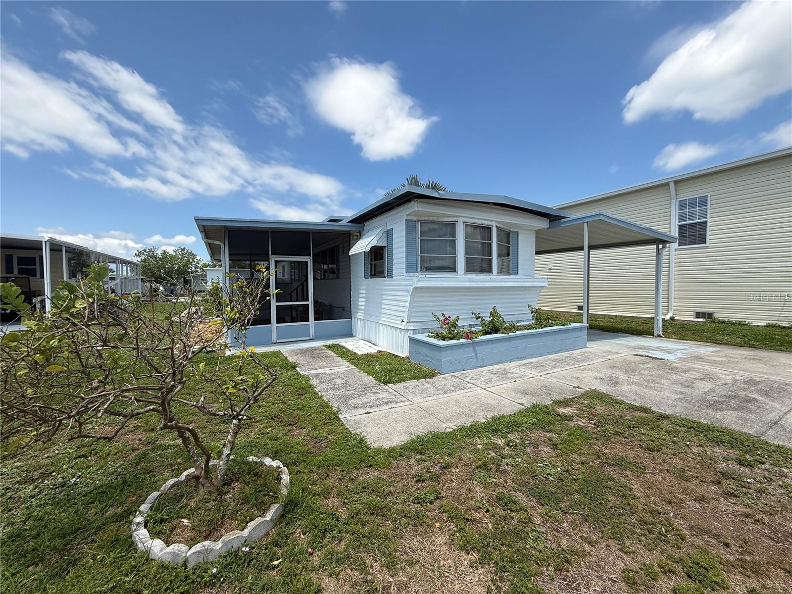 Waterfront Opportunity in Caribbean Isles – Dreaming of life on the water? This affordable canal-front property, in the highly sought-after Caribbean Isles Residential Cooperative, offers the perfect opportunity to create your ideal Florida retreat. Whether you choose to renovate the existing home or replace it with a brand-new manufactured or mobile home, the possibilities are endless! Situated in a 55+ resort-style, gated community, this property is priced right—barely higher than the value of the share/lot alone! - yet a new HVAC system was installed in April. With NO LOT RENT or CDD fees, your monthly maintenance cost is an ultra-low $242, giving you access to a wealth of amenities and waterfront living at an unbeatable price. Step outside, and you'll find your own backyard canal access, where you can add a private dock and set sail to Tampa Bay and the Gulf of Mexico. No dock yet? No problem! The community offers an on-site boat storage lot for only $120–$250 a YEAR—an incredible value for boating enthusiasts. But the perks don’t stop at the water’s edge. Caribbean Isles is a pet-friendly, golf-cart-friendly community with an active social scene. Enjoy a heated pool, shuffleboard and bocce courts, a clubhouse with a library, craft and game rooms, and a packed calendar of dinners, dances, and community events. Plus, with on-site professional management, you can relax knowing everything is well taken care of. This is your chance to own a piece of paradise and become a voting member of this vibrant resident-owned cooperative community.