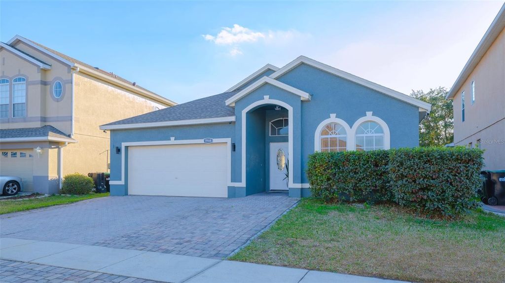 Photo of 1966 Windcrest Lake Circle, Orlando, FL 32824 (MLS # O6383732)
