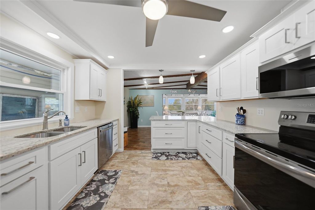 Photo of 554 Parkwood Avenue, North Port, FL 34287 (MLS # C7523838)