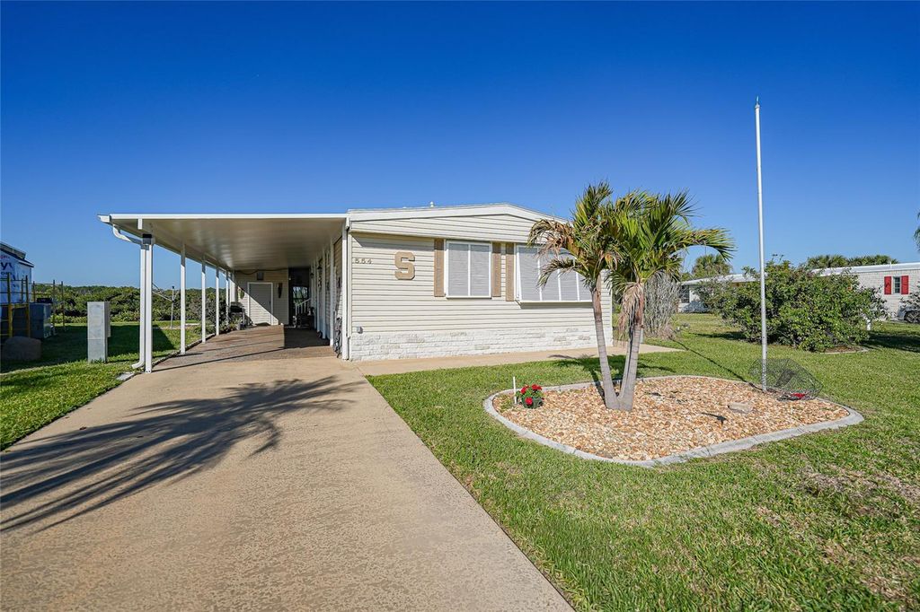 Photo of 554 Parkwood Avenue, North Port, FL 34287 (MLS # C7523838)