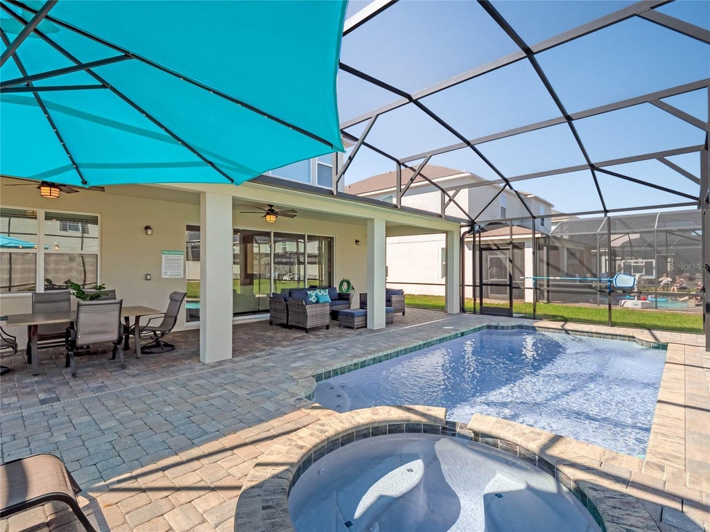 Photo of 8951 Hilton Ridge Avenue, Kissimmee, FL 34747 (MLS # O6451335)