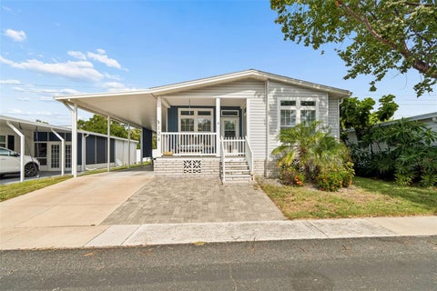 Photo of 124 Pindo Palm Street W, Largo, FL 33770 (MLS # TB8524848)