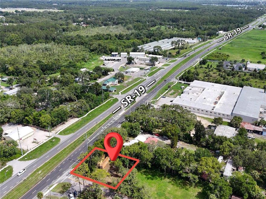 Zoned C-2 Commercial vacant lot available located directly on Highway 19! Perfect opportunity for businesses owners to build a custom commercial building in the developing city of Umatilla, Florida. This nearly quarter acre lot has recently been cleared of trees and debris, fully fenced in with permit, and set up for any business to come in and build their company from the ground up. Don't miss out on this exceptional opportunity before it's gone!