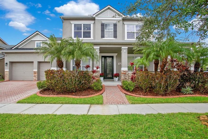 Step into LUXURY LIVING with this exquisite 5-bedroom, 4 full bath, and 2 half bath POOL HOME, nestled within Orlando's coveted Avalon Park South Community! This CORNER UNIT single-family home embodies a seamless blend of ELEGANCE and functionality, boasting distinctive TRAY CEILINGS in both the living room and primary bedroom. The SPACIOUS primary bedroom features a UNIQUE flex space, perfectly suited for creating a cozy book nook or an additional office area. The heart of this residence is the GOURMET KITCHEN, featuring stainless steel appliances, granite countertops, and a convenient BUTLER's KITCHEN. Whether you're a culinary enthusiast or an avid entertainer, this kitchen is a haven of MODERN CONVENIENCE and STYLE. The ALLURE of this property extends to the outdoors, where a PRIVATE POOL awaits within a screened and enclosed patio. This enclosed pool area is ideal for enjoying sunny days or hosting incredible gatherings, offering an ideal setting for both relaxation and entertainment. This home also offers a dedicated office room with FARMHOUSE DOORS, providing a PRIVATE and FUNCTIONAL workspace for those seeking a perfect blend of work and home life. Beyond the comforts of the home, the Avalon Park South Community offers an ARRAY of AMENITIES, including a community fitness center, playground, volleyball court, basketball court, sauna and community pool. IMMERSE yourself in a lifestyle that combines LUXURY with COMMUNITY, creating a PERFECT BALANCE for residents of all ages. Located near Downtown Orlando, 528, 417 & 408 toll roads, Waterford Lakes Town Center, UCF, & Major Attractions. SEIZE the opportunity to make this exquisite Orlando property your own!