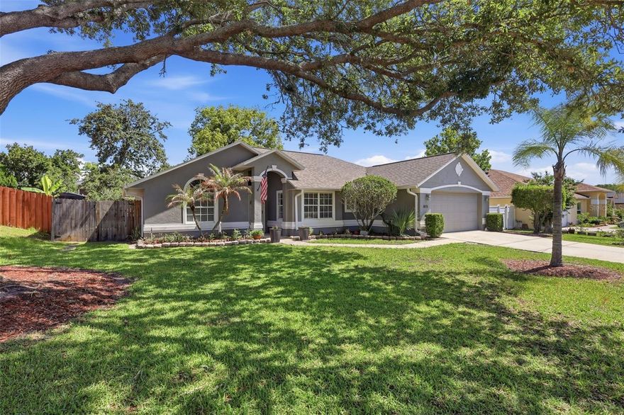 Step into this beautifully maintained open-concept home located in the highly desirable Shadow Ridge neighborhood! From the moment you arrive, you’ll appreciate the charming curb appeal, mature landscaping, and welcoming atmosphere this bright and cheerful ranch-style home offers.

Inside, neutral colors throughout create a warm and inviting feel, while the spacious split-floor plan features 3 bedrooms and 2 bathrooms designed for comfortable living. Laminate flooring flows through the main living areas, with tile in all wet areas for easy maintenance.

The living room opens seamlessly through triple pocket sliders to a 10x20 screened lanai, plus an additional 10x15 concrete patio—perfect for grilling, entertaining, or simply relaxing while enjoying peaceful backyard nature views. The fully fenced backyard is enhanced with mature trees, lush landscaping, and a convenient 6x8 storage shed, leaving the oversized 2-car garage with built-in storage available for your vehicles.

The hall bathroom offers direct lanai access, ideal for outdoor projects or backyard gatherings. Recent updates provide peace of mind, including:
• Roof – 2021
• Electrical Panel – 2020
• Water Heater – 2017
• A/C – 2016
• Newly Updated Primary Bathroom – 2026

Enjoy low HOA fees and an unbeatable location close to shopping, restaurants, medical offices, state parks, state colleges, and top-rated schools. Close to highway - Plus, Florida’s beautiful beaches are only 30 minutes away!

This gem combines comfort, convenience, and natural beauty—schedule your private showing today. This home has been priced just right, so it won't last long! Hurry, hurry!!!
