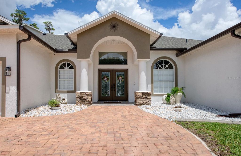 Photo of 1312 Wyndham Lakes Drive, Odessa, FL 33556 (MLS # TB8421618)