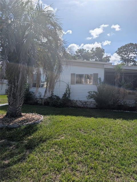 Photo of 469 NE 64th Avenue, Ocala, FL 34470 (MLS # GC541022)