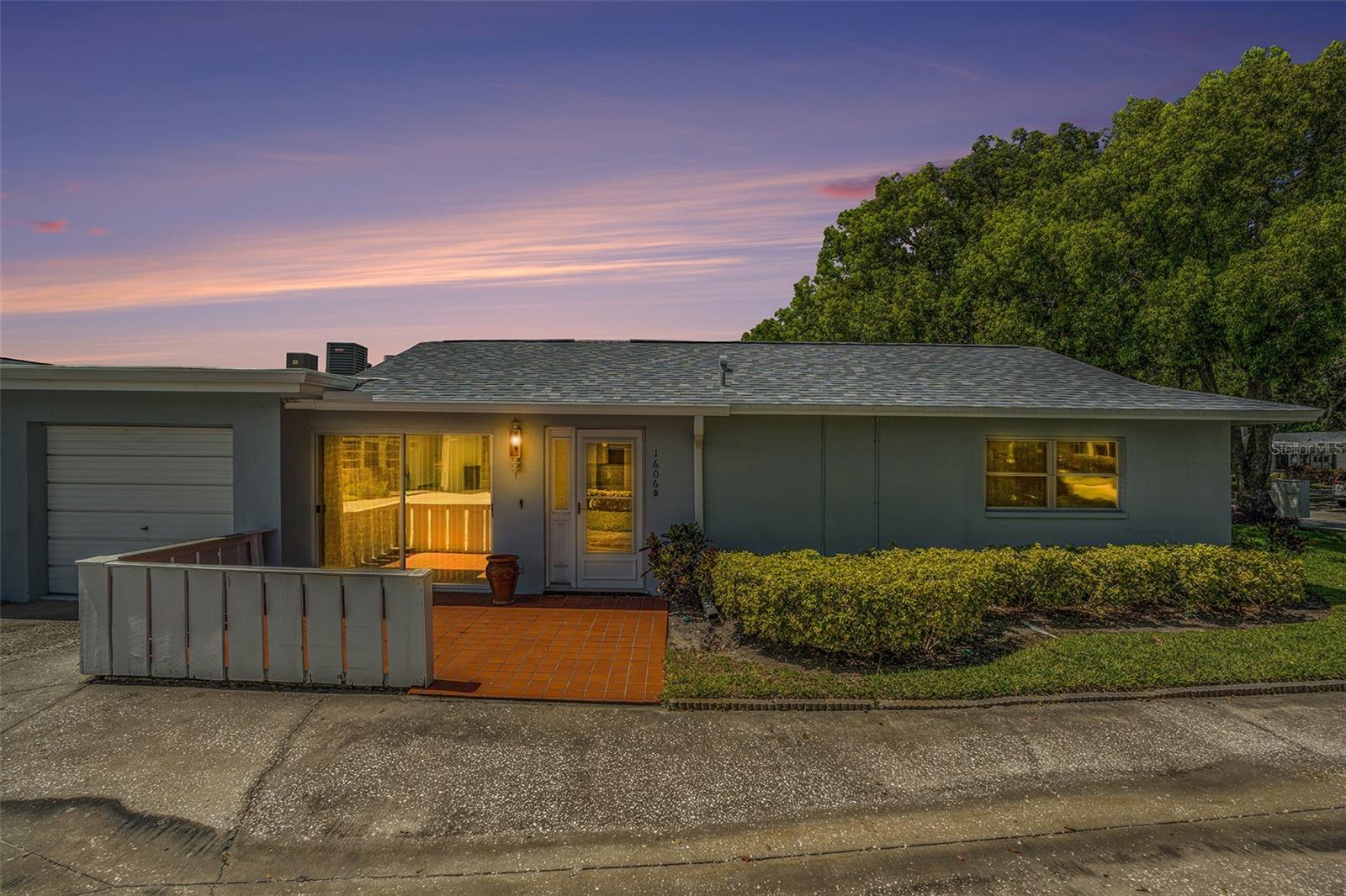 Fully remodeled and move-in ready — bring on the offers! This stunning 2-bedroom, 2-bath villa in the highly desirable 55+ community of Highland Lakes in Palm Harbor has been beautifully updated from top to bottom. The spacious open floor plan is filled with natural light and features stylish wood-look flooring throughout. The redesigned kitchen boasts brand-new cabinetry, granite countertops, stainless steel appliances, and a sleek tile backsplash—ideal for both casual dining and entertaining. Both bathrooms have been modernized with quality finishes, and the primary suite offers a walk-in closet and private en-suite bath with a step-in shower. Additional highlights include an attached garage perfect for a car or golf cart, plus two major upgrades: a brand-new roof and HVAC system, both installed in 2024. The monthly HOA fee includes cable, high-speed internet, water, sewer, trash, lawn care, exterior maintenance, and building insurance—providing true peace of mind and low-maintenance living. Highland Lakes is a premier 55+ golf community offering unmatched amenities, including three private 9-hole golf courses, heated pools, tennis and pickleball courts, a clubhouse with creative studios, RV and boat storage, and access to Lake Tarpon with community pontoon boat cruises. Located just minutes from world-class beaches, shopping, dining, and charming coastal towns like Dunedin and Tarpon Springs—this villa checks all the boxes. Schedule your showing today and experience Florida living at its finest! This particular location is walking distance to restaurants.