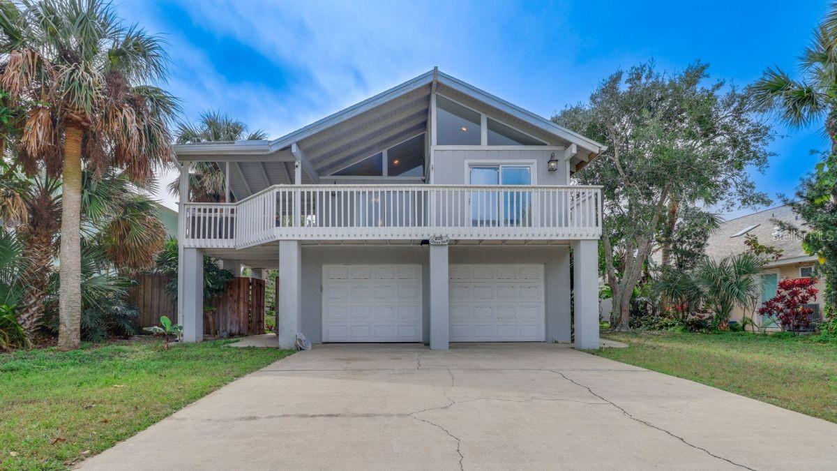 NORTH BEACH LOCATION -- Beautifully remodeled 4/3 beach house in an incredible location! Just 1000 ft from the sand, just .5 miles from Smyrna Dunes Park and Dog Beach, and Just 1.7 miles to Flagler Avenue - this location just cant' be beat! Enjoy relaxing ocean breezes from your second floor deck or roof top Crow's Nest, and the quiet essence of North Beach. With 4 bedrooms and 3 full baths and oversized garage, this home has ample space to be a family beach house for generations to come. The large lot is 65" wide and 149" deep and it is one of the largest on the street with plenty of room for a pool, cabana, or guest house. 2020 Club Car 6 seat gas-powered Onward Edition Golf Cart, in excellent working order, comes with the sale. *Owner will consider carrying financing. This one of the most quiet and serene spots on the island, a truly great neighborhood - don't miss your chance!