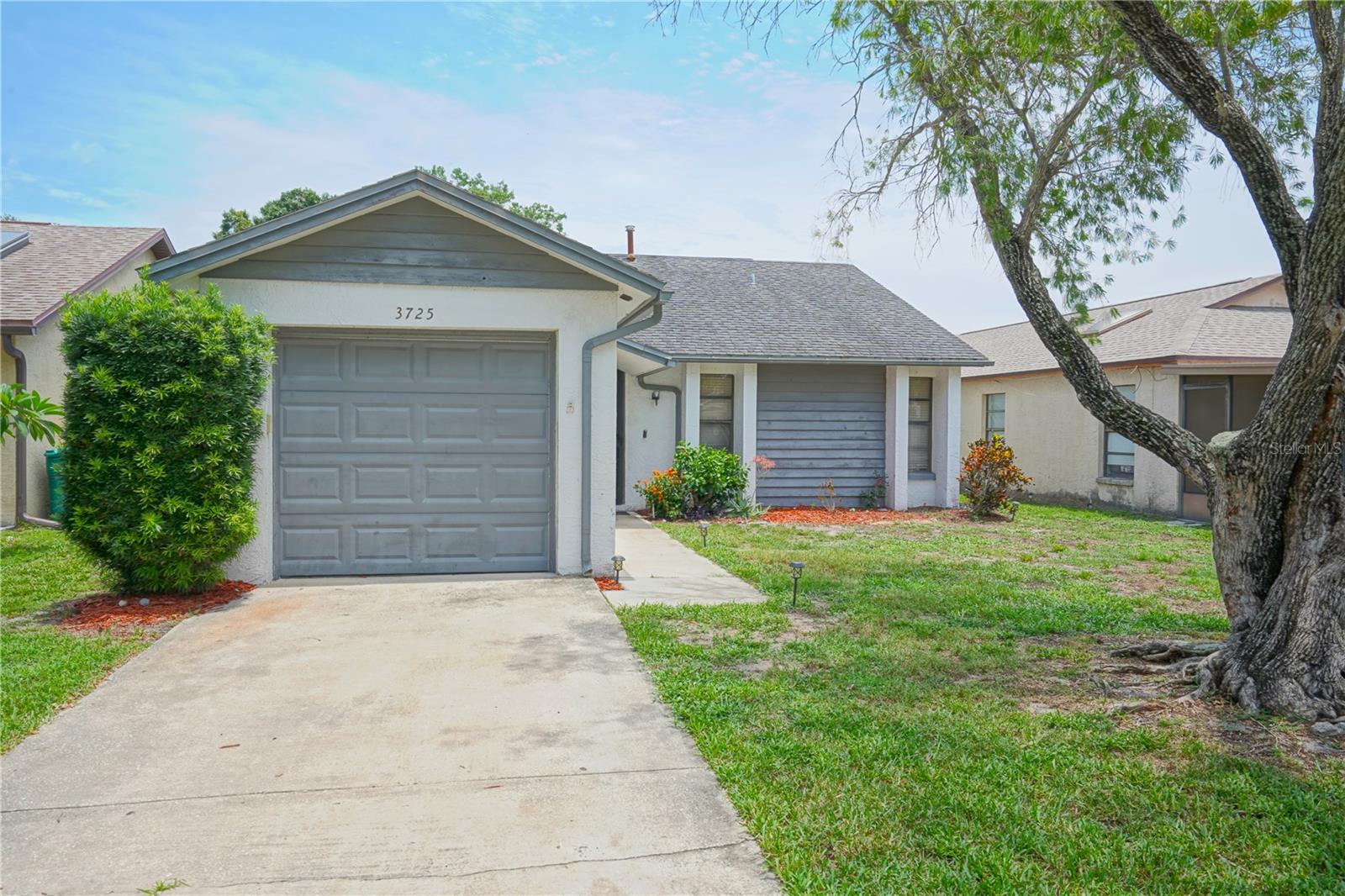 Investor special, home in the heart of Melbourne, located on dead end street with added privacy and green space. Directly across from Wickham Park and close to the King Center, EFSC, shopping, dining, and just a quick drive over Pineda causeway to the beach and Patrick Space Force Base. Strong concrete block and concrete foundation, 2 large bedrooms, 2 baths, large screened in patio, and nice sized back yard. One-car garage and extended driveway. Low HOA of $54/month covers community pool, playground, park, and lawn care. A perfect, low-maintenance primary home to quickly fix and flip, turnkey investment, or primary residence. Seller offering help towards buyers closing cost to repair kitchen sink water damage.
