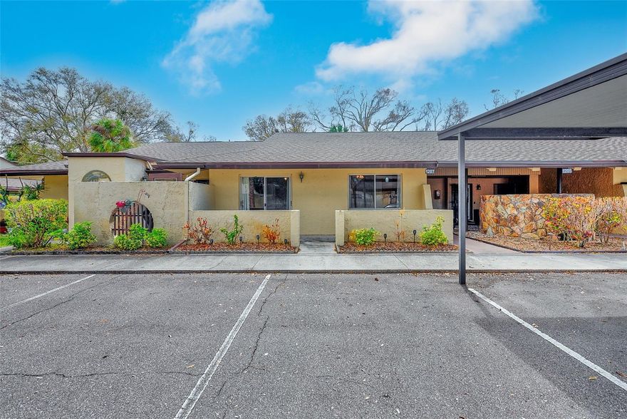 Experience refined Florida living in the sought-after New Haven 55+ community in Largo. This tastefully updated, fully furnished villa-style condo offers 2 bedrooms and 2 bathrooms, designed for effortless seasonal or full-time living. Just bring your suitcase and start enjoying the Florida lifestyle.

The beautifully updated kitchen showcases granite countertops, New appliances, quality cabinetry, and a clean, elegant finish that flows seamlessly into the spacious living and dining areas—perfect for entertaining guests or enjoying quiet evenings at home. Both bathrooms have been thoughtfully updated with a timeless, upscale feel, while indoor laundry adds everyday convenience. Updated windows 

Unwind on your large, enclosed private back patio, an ideal retreat for morning coffee or sunset relaxation. A covered carport is located just steps from your front door, offering easy access and protection from the Florida sun.

New Haven is a peaceful, impeccably maintained 55+ community featuring resort-style amenities including a heated pool, spa, fitness center, and tennis courts—perfect for an active yet relaxed seasonal lifestyle. Ideally located close to world-class Gulf beaches, shopping, dining, and both Tampa International and St. Pete–Clearwater airports, this home offers the perfect balance of convenience and tranquility.

Move-in ready, beautifully furnished, and ideal as a comfortably pleasing winter retreat or elegant year-round residence.