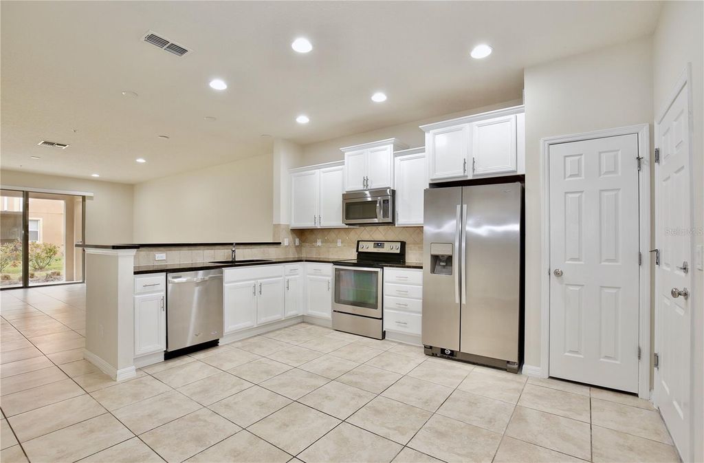 Photo of 717 Virtuoso Lane #85, Orlando, FL 32824 (MLS # O6374684)