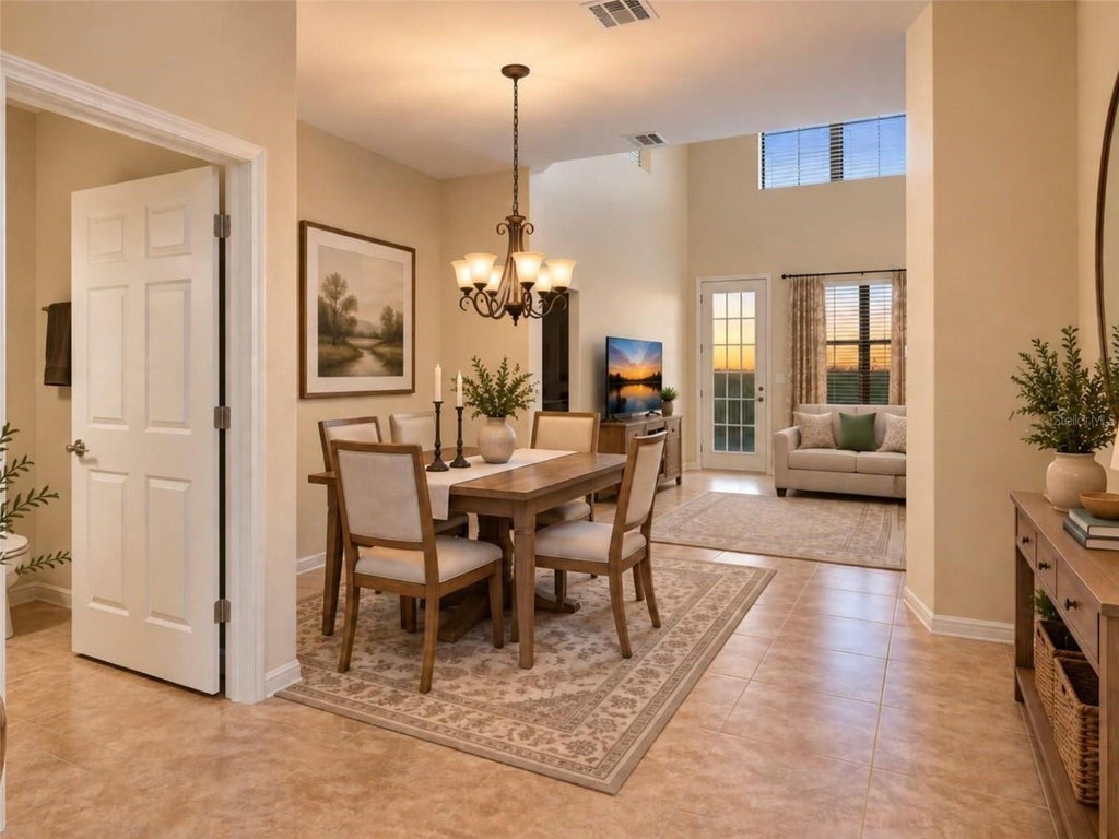 Photo of 740 Chacall Loop, Mount Dora, FL 32757 (MLS # O6452388)