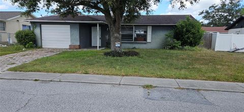 Photo of 7051 Fireside Drive, Port Richey, FL 34668 (MLS # TB8437936) Photo of 7051 Fireside Drive, Port Richey, FL 34668 (MLS # TB8437936)