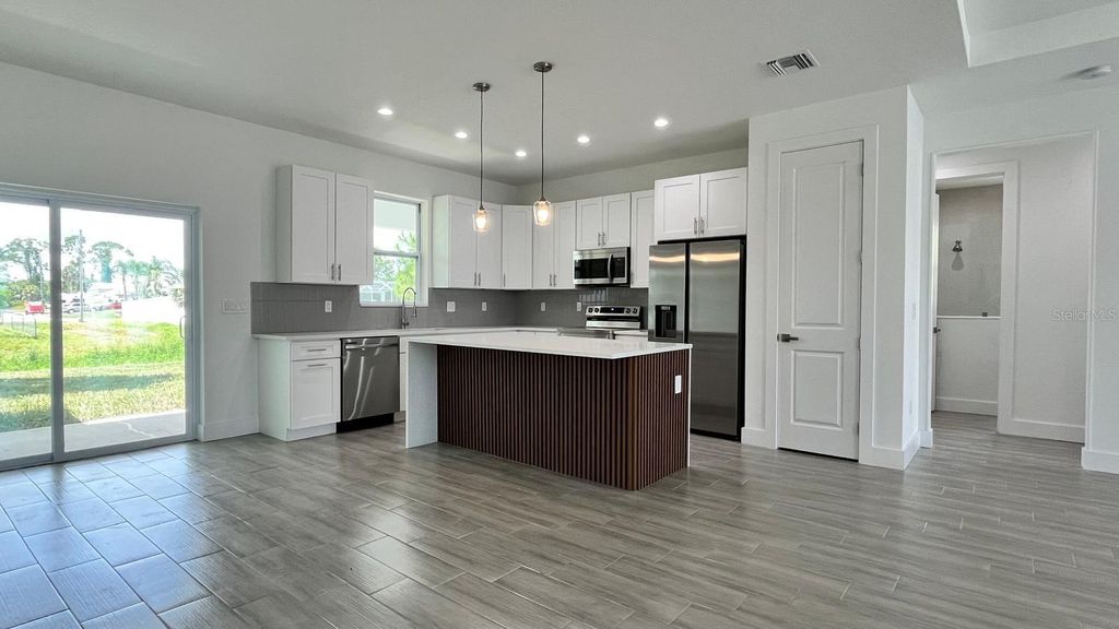 Photo of 4661 Fairlane Drive, North Port, FL 34288 (MLS # O6354583)