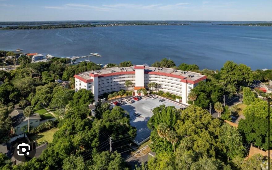 $2,350.00 A MONTH INCLUDES ALL UTILITIES (except internet)!!!!  Imagine you living in this condo with incredible amenities and both a Lake and Pool view.  This thoughtfully designed condo presents an inviting haven, perfectly suited for professionals, retirees, or anyone searching for a residence that balances modern living with timeless charm. Beyond your doorstep, the building offers a wealth of amenities designed to enhance your lifestyle. Residents have exclusive access to a fitness center, and a sparkling outdoor swimming pool overlooking Lake Dora for leisurely afternoons. For those who love to host, a stylish community lounge and BBQ area are available for gatherings, from casual get-togethers to festive celebrations. Stroll to Downtown Mount Dora where you can enjoy shopping, dining in a variety of restaurants or participating in the many cultural events. Covered parking for your convenience. Don't miss this opportunity to live in one of Mount Dora's most sought-after location's.