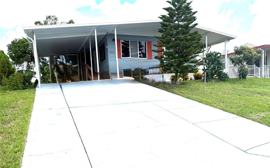 Photo of 8869 Highpoint Boulevard, Brooksville, FL 34613 (MLS # TB8415476)