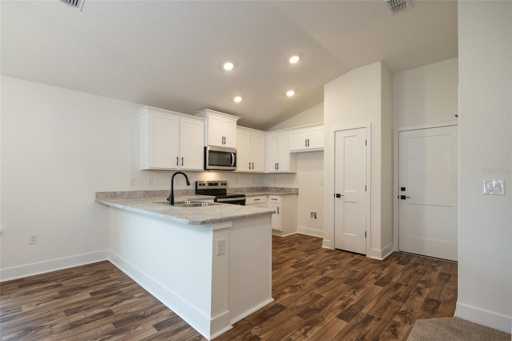 Photo of 46 Russell Dr, Palm Coast, FL 32164 (MLS # FC322352)