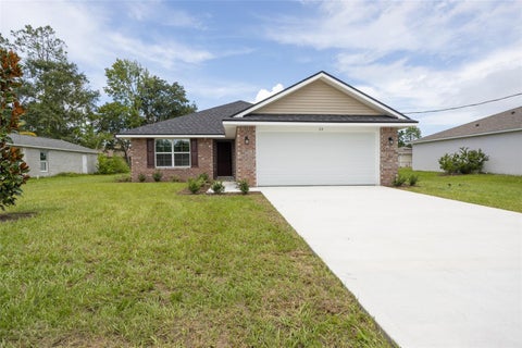 Photo of 46 Russell Dr, Palm Coast, FL 32164 (MLS # FC322352)