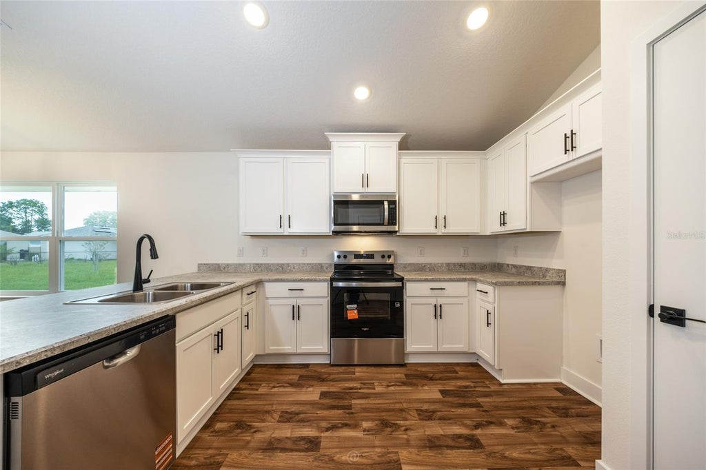 Photo of 46 Russell Dr, Palm Coast, FL 32164 (MLS # FC322352)