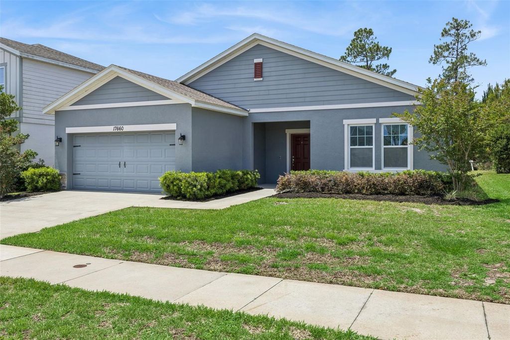 Photo of 17660 Passionflower Circle, Clermont, FL 34714 (MLS # O6404594)