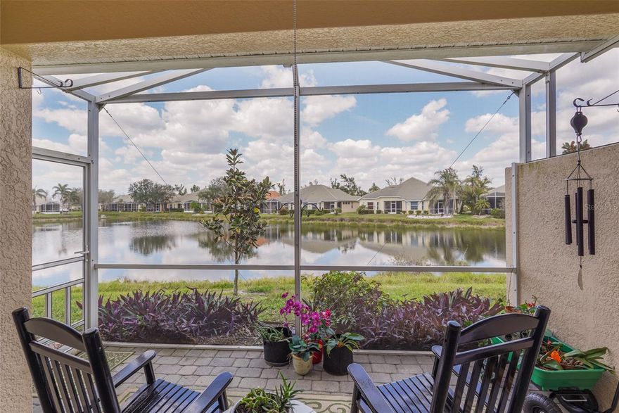 Set against a tranquil water view, 9847 Hawk Nest Ln offers an inviting blend of comfort, style, and low-maintenance living within the sought-after gated community of Talon Bay. This bright and open residence features tile flooring throughout the main living areas and flows seamlessly into a beautifully appointed kitchen with granite countertops, a brand-new stove and refrigerator, and a premium Bosch dishwasher. A nearby laundry room includes a new washer and dryer, along with added storage for everyday convenience. The spacious primary suite serves as a relaxing retreat, showcasing luxury vinyl plank flooring, plantation shutters, dual walk-in closets, and a well-appointed en-suite bath. A comfortable guest bedroom also features LVP flooring and a built-in Murphy bed, offering exceptional flexibility for visitors or multipurpose use. The den provides additional versatility as a home office, creative space, or quiet sitting area. Step outside to the screened lanai and enjoy peaceful water views and gentle Florida breezes—an ideal setting for morning coffee or evening unwinding. Carefree living is enhanced by the HOA, which includes exterior maintenance, lawn and shrub care, and cable service. Residents of Talon Bay enjoy resort-style amenities including a heated community pool, fitness center, tennis and pickleball courts, kayak launch, and a welcoming clubhouse with an active social calendar. Ideally located between Sarasota and Fort Myers, the home is just 1.5 miles from Warm Mineral Springs, close to shopping and dining, and a short drive to world-famous Gulf beaches. A truly move-in-ready waterfront opportunity in Talon Bay, this home invites you to enjoy the best of Florida living.