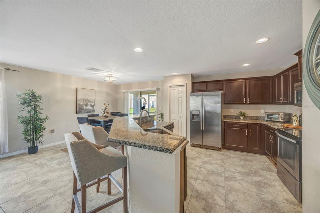 Photo of 5048 Chipotle Lane, Wesley Chapel, FL 33544 (MLS # TB8454357)