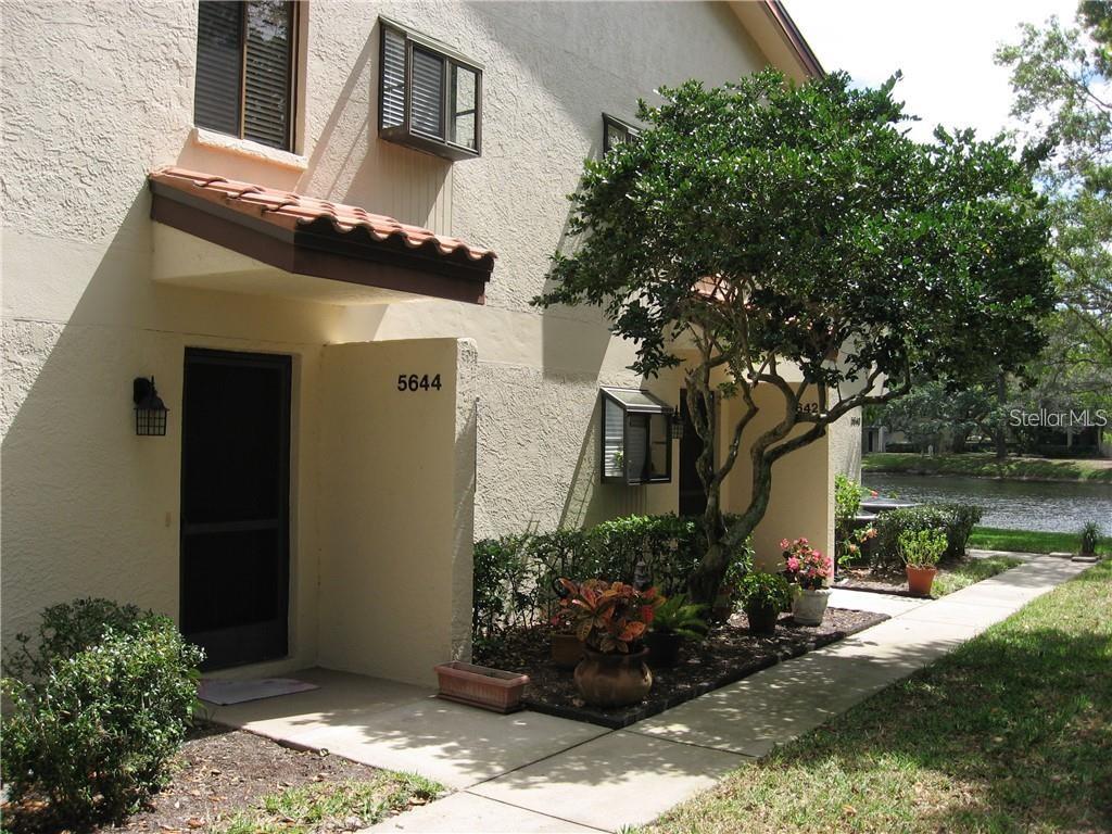 Available December 1st, 2025. This beautifully upgraded first floor two bedroom/ two bathroom condo boasts 1,068 sf of living enjoyment conveniently located in The Gardens subdivision of The Palm Aire Golf and Country Club (membership in not mandatory). Enjoy the Florida lifestyle in this recently updated condo featuring fresh paint, ceiling fans with lights and carpet flooring, butcher block counter tops in the kitchen with wood cabinets, newer appliances and a garden window. New A/C system and washer/dryer in 2018. Owner is considering to replace the tile in entryway and kitchen and carpeting in all rooms except bedrooms with vinyl wood grain flooring. Open living room and dining room plan with pass through from kitchen for easy serving. Large master walk in closet with an updated master bathroom and in unit laundry. Screened lanai with storage to enjoy the ideal Florida weather. Perfect for year round or seasonal living. Just steps to the heated pool, tennis courts, clubhouse and the shuffleboard court all in a golf course community. Friendly pet policy allowing for one small dog or cat up to 20lbs. Units must be rented subject to the condo association rental policy. Mandatory Nonrefundable Cleaning Fee $250.00 upon Execution of Lease. This is a non smoking unit and Landlord recommends tenant to have Rental Insurance. Close to the new UCT Mall for abundant shopping, restaurants, entertainment and medical facilities plus 15 minutes to the famous gulf beaches. Easy access to I-75. Great location, great community.