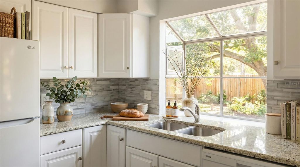 Photo of 7616 Pacific Heights Circle, Orlando, FL 32835 (MLS # O6402436)