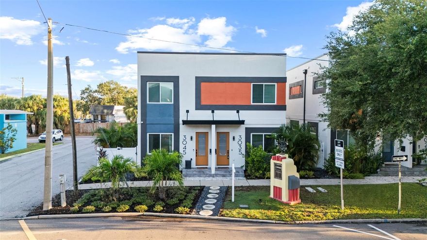 2.99% Financing for Qualified Buyers!  NO HOA! New construction! NO FLOOD INSURANCE IS REQUIRED! Seller is offering a 3-2-1 buy down or up to $30k in seller incentives with an acceptable offer. There's no need to wait for rates to reduce. You can start enjoying the Florida lifestyle right away! This townhouse is all about lifestyle. The Grand Central District is located in the heart of the city, just one block from Central Avenue. Walk or bike to vibrant downtown St Pete, which boasts numerous new restaurants, bars, shops, music venues, sporting events, and beaches! The interior of this contemporary home is stunning! When you enter, you will note high ceilings and an open floor plan with a spacious living and dining area that flows seamlessly into a sleek European chef's kitchen with Samsung Bespoke Stainless Steel appliances, quartz worktops, and elegant fixtures. This property is the ultimate Florida entertaining home, with smart-home wiring and technology ready for all of your technology requirements, as well as ambient lighting throughout! The primary bedroom, located upstairs, features a magnificent ensuite bath and a full walk-in closet, making it ideal for an evening hideaway. The upstairs includes a second bedroom with its own ensuite bathroom, along with an upper laundry area. A low-maintenance xeriscape paver courtyard is an excellent setting for casual outdoor entertaining. Alley access to a large one-car garage with a 220V EV charging outlet and epoxy floors allows for easy parking. This home has it all, including a one-of-a-kind Accessory Dwelling above the garage with a separate entrance that could be used as an in-law apartment, guest accommodations, home office, quiet retreat, or rented out to generate extra income. Current zoning allows AirBNB and VRBO short term rentals! This ADU is private, but has the stress free living of a downtown hotel. Don't pass up this unique opportunity to live in style, only steps from everything the Grand Central District and downtown St Petersburg have to offer!