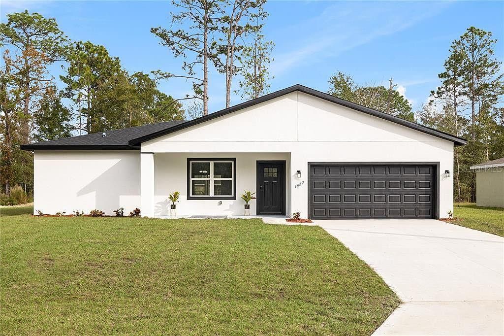 Photo of 1557 W Elder Lane, Citrus Springs, FL 34434 (MLS # O6378483)