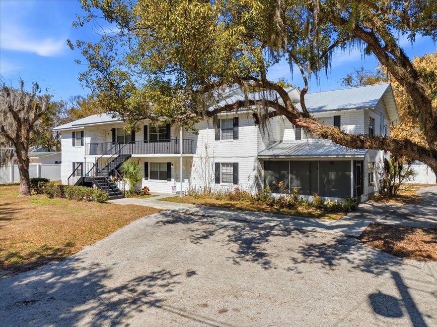 E is for Excellent! Check out this newly refurbished 2-bedroom 1.5-bath two floor apartment in the beautiful neighborhood of Historical Downtown Bartow. Less than a mile to local schools, shopping, banking, courthouse, and ALL those fun downtown events like Friday Fest, holiday parades, SyFy, etc. Never fear a storm from within this sturdy concrete block-constructed building with new metal roof, and solid firewalls separating the five units. Enjoy easy-clean porcelain tile floors throughout, central heat and air, eat-in kitchen, and spacious bedrooms, both with large closets. Also included is free lawncare, a quiet screened porch with garden view and lovely breezes, plus washer dryer hookups in the kitchen too. Pet-free, smoke-free, noise-free and drama-free complex. We keep our noise levels low and our neighborliness high here – if you always do the same, we want YOU! (Application required for all residents 18+, clean background check, 625+ credit score, employment verification, income 3x rent.)