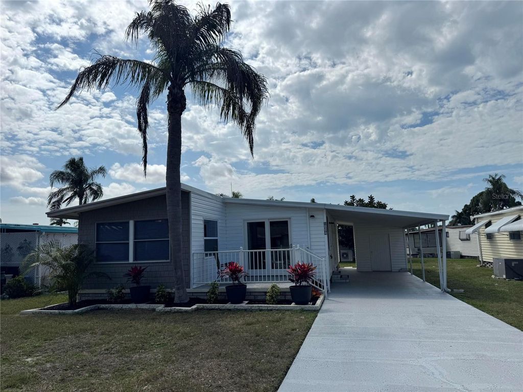 Photo of 10374 106th Avenue #9, Largo, FL 33773 (MLS # O6403733)