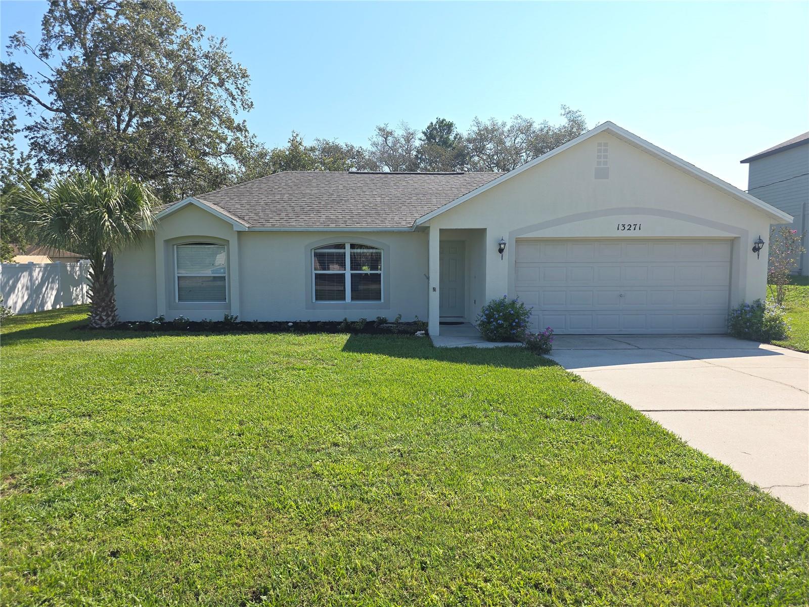 Spring Hill 4 Bedroom Home 2 Full Bathrooms And A 2 Car Garage On .30 Acres- Enter The Home To Tiled Entry Foyer- Hall Closet And Vaulted Ceilings- Tiled Eat In Kitchen With A Breakfast Bar, Dining Room And 2 Pantries- Plus Separate Living And Family Rooms- The Primary Bedroom Has A Walk In Shower And Walk In Closet- Extras Include Roof 2025, A Screened Porch And Private Yard- Interior Paneled Doors, Ceiling Fans, Inside Laundry And Plant Shelves- Open Floor Plan- Call Today for A Showing.
