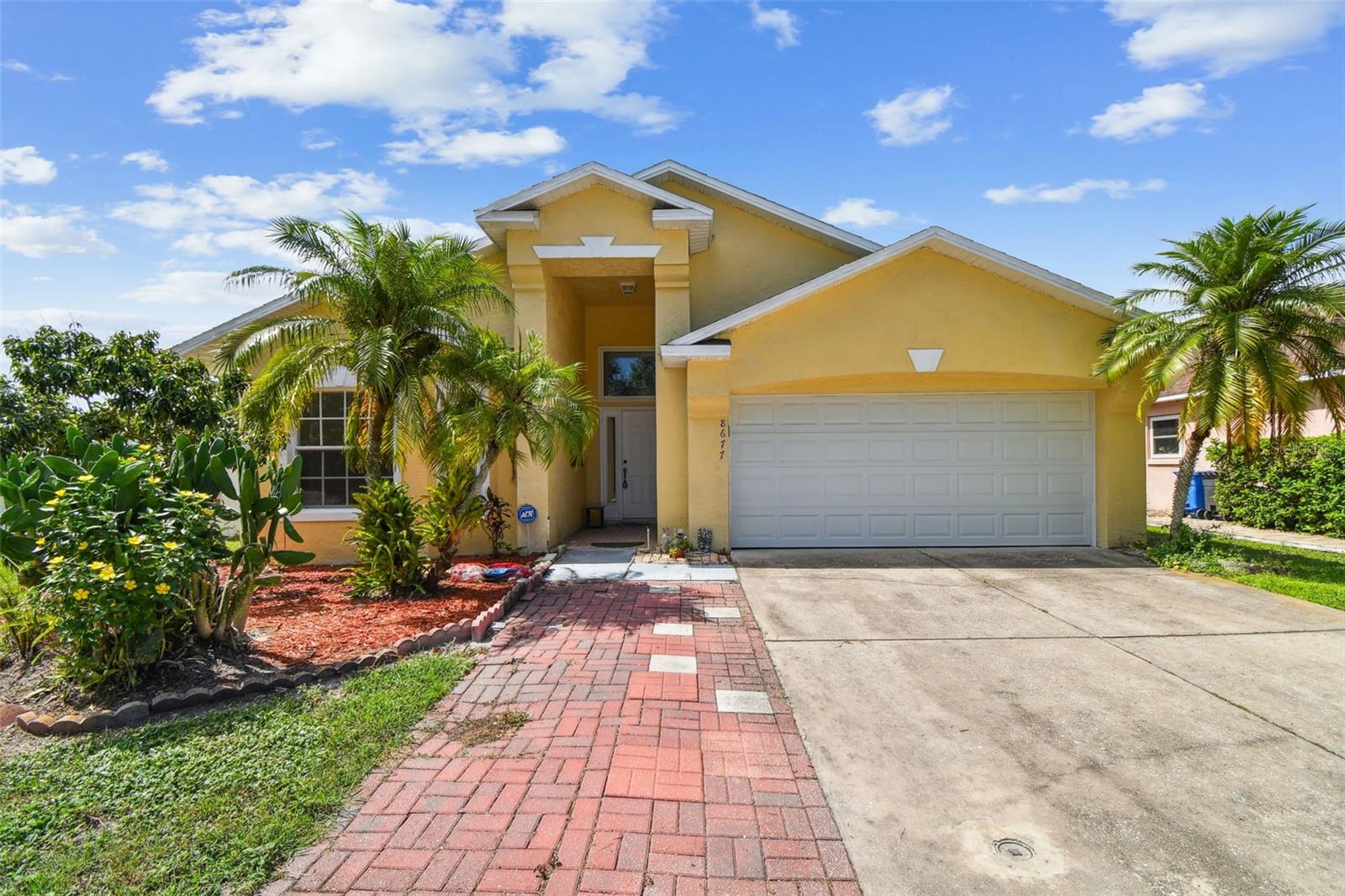 One or more photo(s) has been virtually staged. Welcome to the very desirable community of Charleston Corners in Tampa Florida! This beautiful corner lot with water view home features 4 bedrooms, 3 bathrooms, 2 car garage, dining room, living room, breakfast area, and covered lanai with a huge screened room for your enjoyment. NOT in a flood zone. The spacious living room is great for gatherings and enjoying time with friends and family. Vaulted Ceiling in almost every room. Floor Tiles throughout the entire home. This beautiful property is in a community with clubhouse, pool, tennis, and playground! Mature fruit trees for the family to enjoy! One of the best locations in Tampa with the best schools, close to shopping malls, supermarkets, pharmacies, beach and many more. 10-15 minutes to the Tampa International Airport. Roof was replaced in 2016 and AC replaced in 2022 for a peace of mind. Schedule your private tour today to learn more about this property!