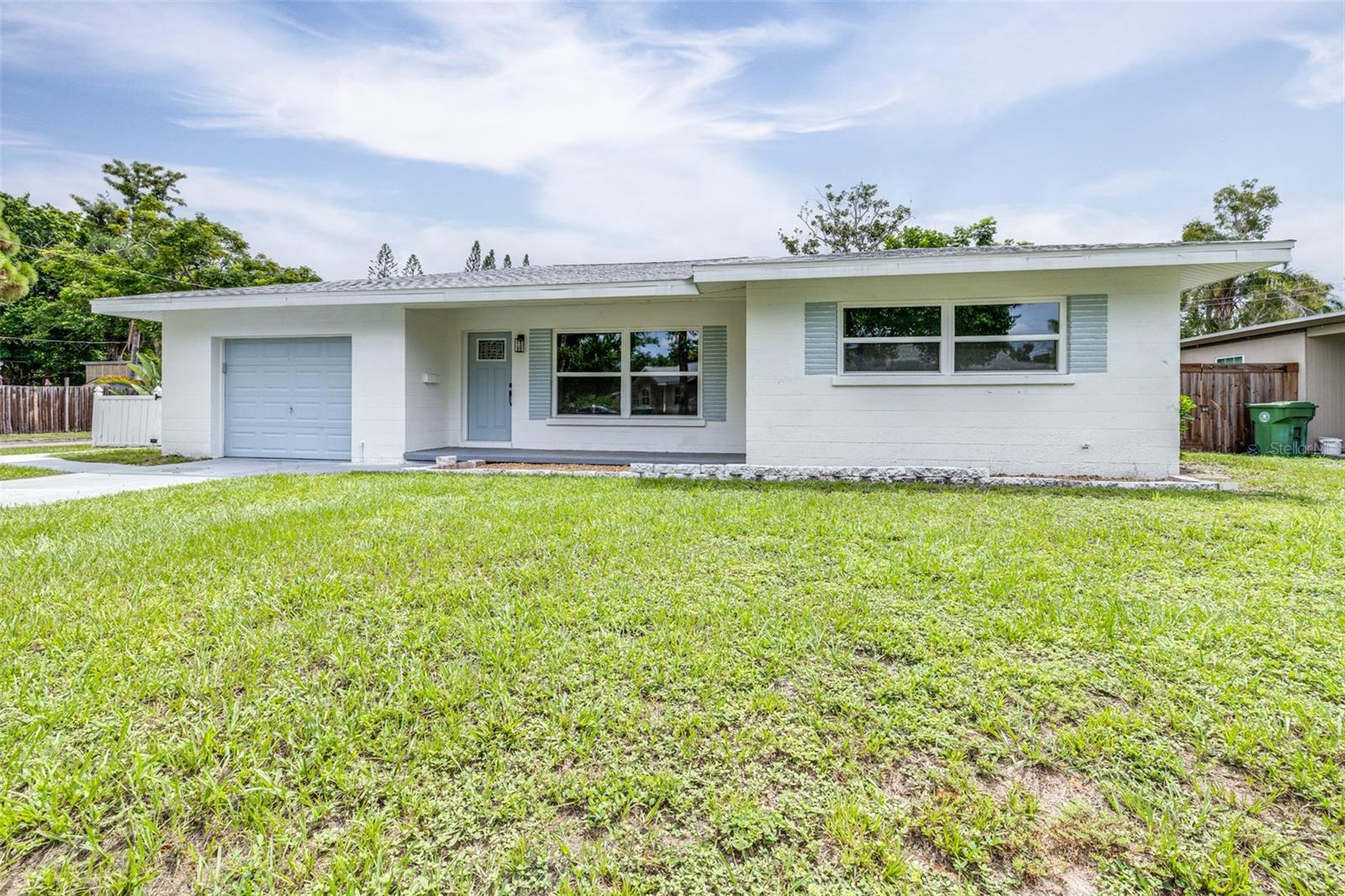 Don't miss this beautifully remodeled 3/2 + 1 car garage on a fenced corner lot in sunny Bradenton! Updates include New Roof, New AC, New Windows, New Floors, New Kitchen, New Appliances, New Bathrooms, New Hot Water Heater, New Paint as well as Updated Plumbing and Electrical. Peace of mind for years to come! Only 20 minutes to Bradenton & Holmes Beach! 10 minutes to downtown Bradenton! Close to I-75 & HW 41, shopping and schools.