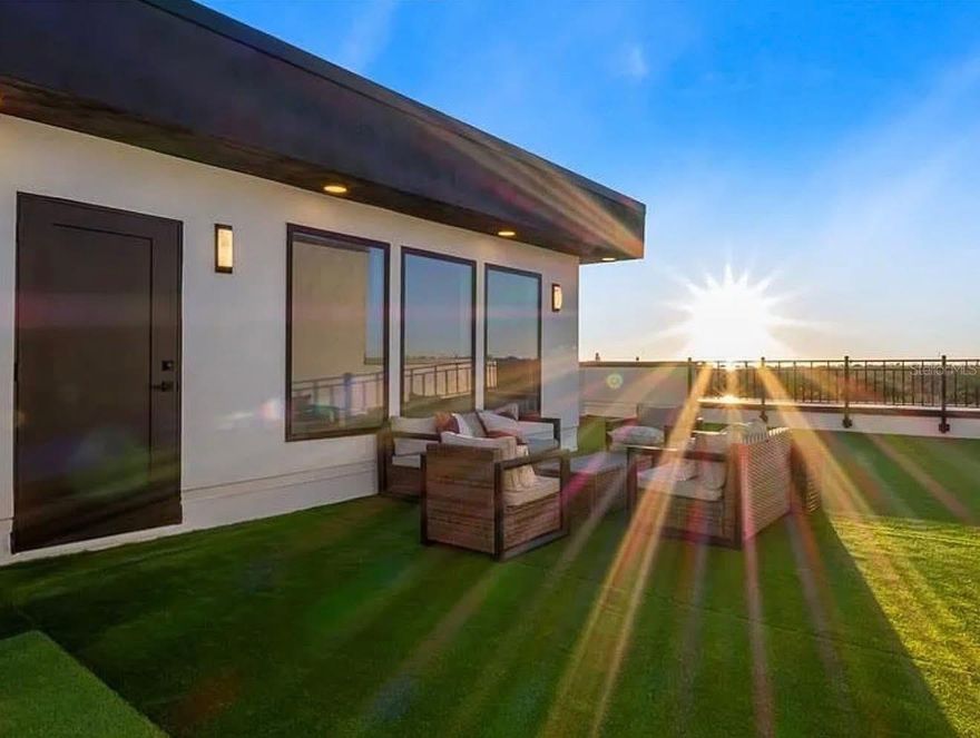 If views, privacy, and presence matter — this is the one. Not just a townhome—this is a vantage point. Welcome to Unit 5 at 4th Street Gardens, a private gated community in Historic Old Southeast, positioned on the edge of Downtown St. Petersburg. This premier corner residence holds one of the most desirable positions in the building, offering the best panoramic views and enhancing the sense of openness, light, and connection to its surroundings. Fully completed, this modern home offers approximately 2,280 sq ft across three levels, plus an expansive rooftop terrace of nearly 1,000 sq ft—ideal for entertaining while enjoying breathtaking sunrise and sunset views. Features include a Modern kitchen, high ceilings, three private en-suite bedrooms with a spa-inspired owner’s suite, a private fenced yard, an oversized garage with 16’ ceilings, and elevated high-and-dry construction; the property did not experience flooding during recent storms. Additional highlights include a 20-year no-dollar-limit roof warranty and a 2-10 Home Buyers Warranty. Located just minutes from the university, Bayfront Hospital, Central Avenue dining and entertainment, waterfront parks, kayaking, and all Downtown St. Petersburg amenities.