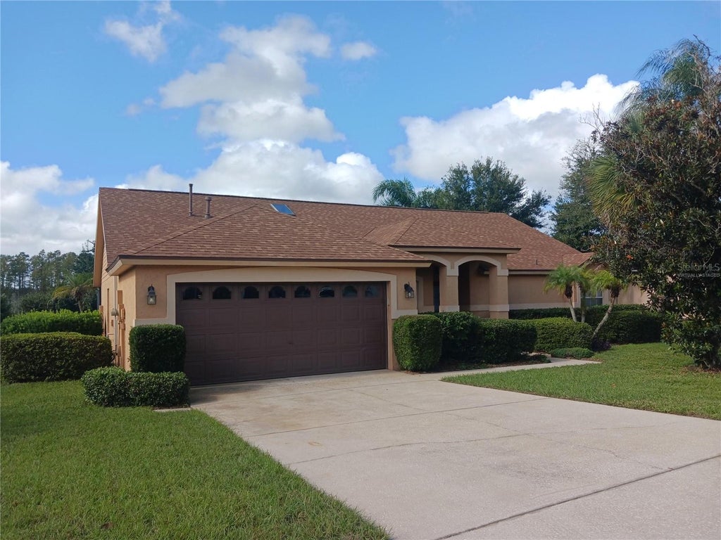 Photo of 1811 Nectarine Trail, Clermont, FL 34714 (MLS # O6453088)
