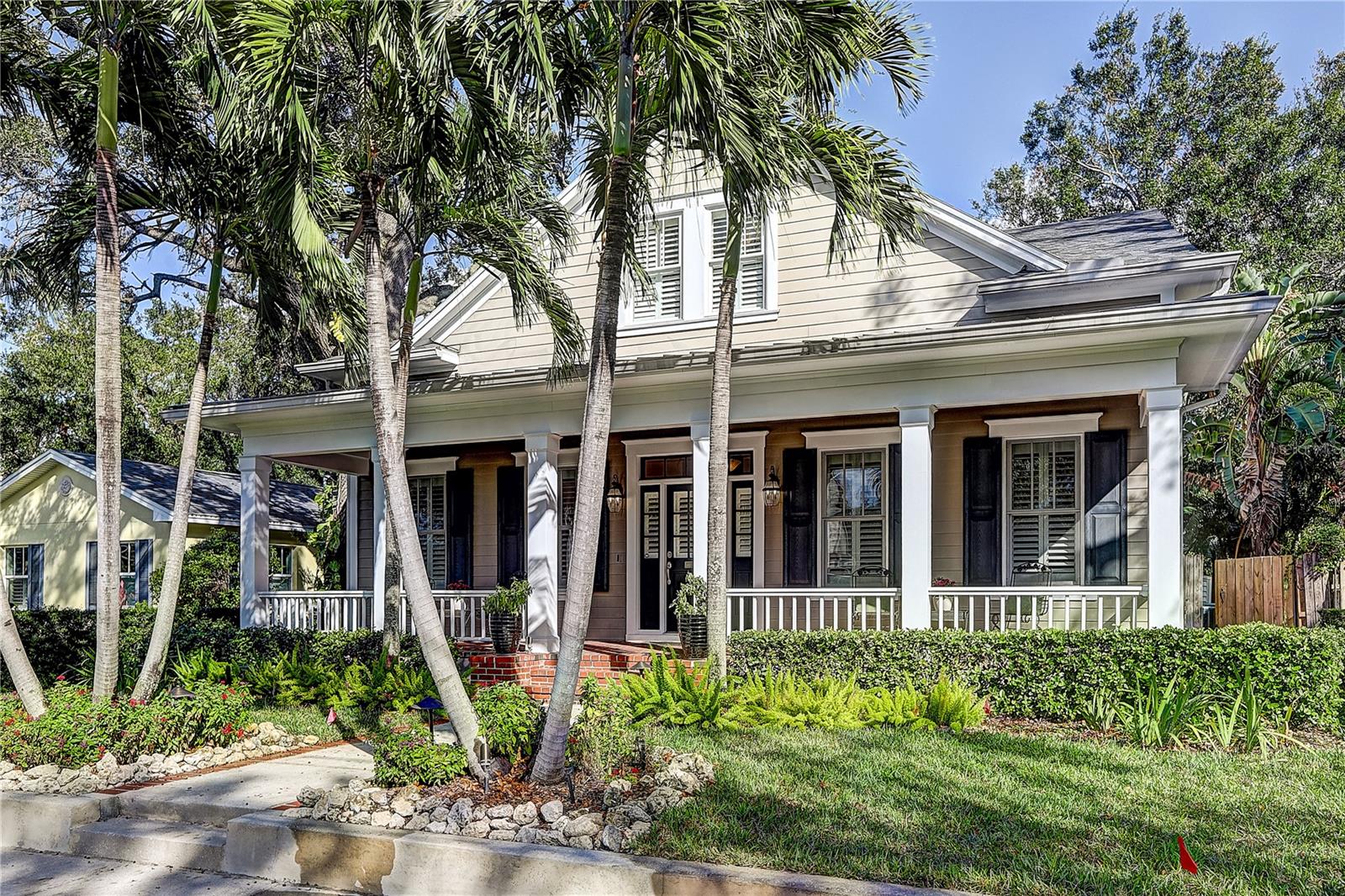 804 S Fremont Ave is a rare find in Historic West Hyde Park. Built in 2008 by Sample Properties, this house mirrors the celebrated historic architecture of Hyde Park while incorporating modern standards of today. Built on an elevated slab foundation, this house has remained “high and dry” since it was built and did not sustain any damage from the hurricanes of 2024. There is always something to do around here, just two blocks from popular Hyde Park Village, with casual and upscale dining, shopping, a movie theater, playground, and outdoor markets. It's also just a short walk to the famous Bayshore Boulevard. The front of the home features mature landscaping and a welcoming brick-laid front porch. Upon entering, you'll notice the 10-foot ceilings, hardwood floors, and oversized crown molding throughout the first floor. To the right is an office with floor-to-ceiling built-in bookshelves. To the left is the dining room, leading through a pocket door to the open floor plan, which includes a kitchen, family room, and bar area—all perfect for quiet evenings with the family or entertaining. The gourmet kitchen has space for a dining set for six and features dual ovens, a six-burner gas cooktop, pot filler, large island, and gorgeous granite countertops. The family room boasts a gas and wood-burning fireplace, recessed TV, and a wet bar with a sink, wine fridge, small fridge with ice maker, dishwasher, and kegerator. The backyard is visible from the family room’s oversized windows. On the main floor is also the primary bedroom suite, which offers 240 square feet of bedroom space with private access to the backyard. The ensuite is complete with a jetted soaking tub, large shower, separate toilet room, and walk-in closet. Adjoining the ensuite is a spacious laundry room with a sink, cabinets, and easy access to the primary closet. Under the staircase, near the charming powder room, is a cozy nook perfect for an upright piano. Heading upstairs, you'll find a second family room, ideal as a man cave, kids’ space, or movie room. The second floor also features three nicely sized bedrooms, all with walk-in closets, and two additional full bathrooms, two finished storage rooms and a media closet complete the second floor. The fully-fenced outside space is accessible through the kitchen, family room, or primary bedroom. It has a large brick deck with space for both lounging and eating areas, complete with a gas hook-up for an outdoor kitchen. Beyond the deck is a large yard, updated in low-maintenance turf. The two-car garage, also in the rear of the house, has fully covered access to the house. The carriage house over the garage, with a private entrance beyond the brick deck, is equipped with a fridge, sink, dishwasher, clothes washer/dryer, separate AC, closet, full bathroom, living room, and bedroom—great for guests, an in-law suite, rental income, or a nanny. This house is also equipped with an Electric Vehicle (EV) charger in the garage with Vehicle-to-Home charging capabilities to power the carriage house in the event the house loses electricity. Located within the highly sought-after Plant High School district and minutes from the nationally ranked Tampa General Hospital. Additional home features include two tankless gas water heaters, a new roof (2024), new front yard irrigation (2024), new main house ACs (2020), new carriage house AC (2024), new exterior trim paint (2023), and fresh interior paint (2024).