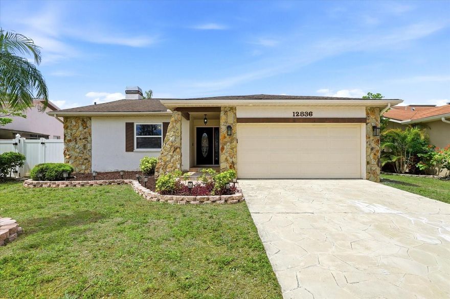 One or more photo(s) has been virtually staged. Pool + Spa. Vaulted Ceilings. True Split Floor Plan. Central Pinellas Location.

A home that delivers space, thoughtful updates, and a backyard designed to be enjoyed every day. This 3-bedroom, 2-bath, 1,465 sq ft residence offers a true split floor plan with vaulted ceilings, wood flooring throughout the main living areas and bedrooms, and a wood-burning fireplace that anchors the space. Natural light pours in through French doors, opening to a private, fully Vinyl fenced backyard.

The outdoor space is a standout—featuring a resurfaced pool deck with updated pavers, coping, and waterline tile, surrounded by mature palm trees and an additional 250 sq ft covered lanai, ideal for entertaining and relaxing.

The updated kitchen offers granite countertops, white cabinetry, under cabinet lighting, stainless steel appliances, and an open layout that flows seamlessly into the main living and dining areas and out to the lanai.

The primary suite includes a walk-in closet and private ensuite bathroom with a walk-in shower, while the true split layout provides privacy for guests or family.

The home features a WHOLE-house Aquasana Water Filtration System with UV purification, along with a Kinetico water softener. Your water needs are fully met! The property has a large oversized 2 Car Garage (almost 400 Sq Ft!).  Hot Water Heater 2023,  Roof 2016, 3 TON 14 SEER HVAC 2016, All Windows 2012. 10.6 Base Elevation - Elevation Certificate attached. 

Located in Unicorporated Largo in central Pinellas County, this home offers exceptional access—just 10–15 minutes to the Gulf beaches, approximately 25 minutes to Tampa International Airport or downtown St. Petersburg, and walking distance to local favorites like FAMOUS Frida’s Bakery & Restaurant and nearby county open space for outdoor enjoyment.

Short-term rentals are permitted subject to county registration, inspection, and zoning verification. Long-term rental history available, offering flexibility for personal use or income potential.

Positioned at an exceptional value for the area, this is a rare opportunity to own a solid, well-located pool home with both lifestyle appeal and investment potential.